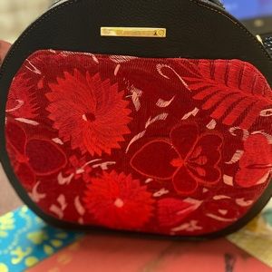 Red, embroidered handbag